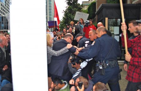 Attempts to cross protest line into back door of the 'Vancouver Club'