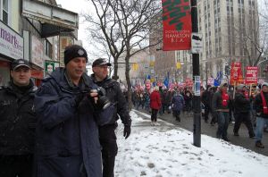 Officer 621 and friends, some of the many cops stationed to watch anti-capitalist demonstrators