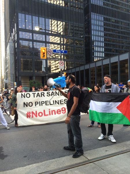 The demonstration blocks the Bay and King intersection [Credit: Iris Robin]