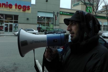 Julian reading a statement from the 32CSM