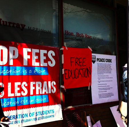 Students put signs and a 'peace code' on the window outside the office. (photo Christina A)