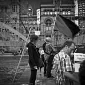 Red and black flags were also prominent at the rally.