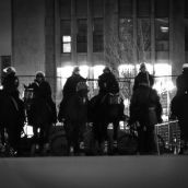 A line of riot cops on horseback lay in wait.