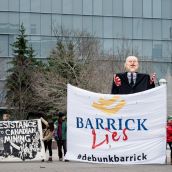 The protest's mascot is a giant Peter Munk effigy with a Pinocchio nose and blood on his hands. photo:allan.lissner.net