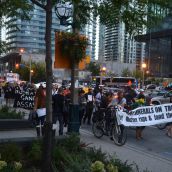 Participants marched down Bay Street in Toronto's financial district.