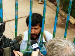 Nov. 26, 2009 - Students at UNAH, the Autonomous University of Honduras, staged a one-day occupation of the campus in defiance of the regime's establishing a polling station at the university's gates.  A student organizer with the Resistance explains that, the night before, another student involved in the Resistance disappeared from this same spot after a brief confrontation with police and had not been heard from since.