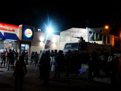 Nov. 30, 2009 - The confrontation at the Brazilian embassy builds as Hondurans demonstrate their commitment to restoration of constitutional order and police hold their line in front of the embassy.  The presence of a Burger King right on the square that has been the site of so much struggle in the past four months is a painful and poignant irony.