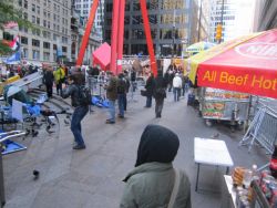 along the side of the protest is this walkway, full of vendors and photographers 