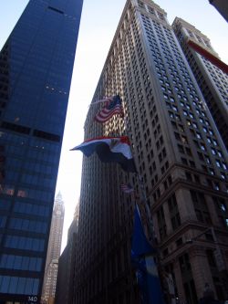 The American flag flies above an Egyptian flag flown at the Tahir Square protests