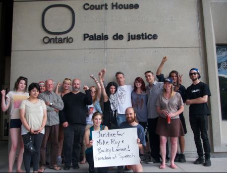 Mike and Bailey gather with supporters after their release. Credit: Zach Ruiter