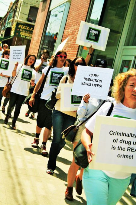 Attendees march on Queen Street. [Credit: Doug Gill]