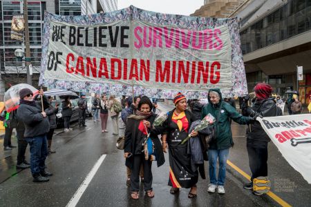 After the women came out of the meeting, the police refused to let us be on the sidewalk, we told the police that that meant we would have to take the street. They said, go ahead, but I don't think they were prepared for what happened next – we took all of Front street! Photo: Allan Lissner