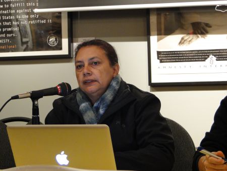 Betty Matamoros, an organizer from Honduras, spoke to a crowd of about 80 people (photo: Raul Burbano)