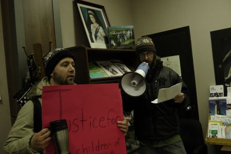 Darryl reads the names of those killed in Gaza during Operation Pillar of Cloud