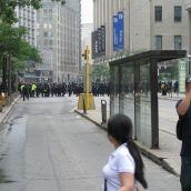 More cops 1 block east at Yonge St. and College St. (1/2 block east of Toronto police headquarters) 