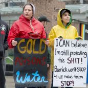 Hand-made placards at Barrick AGM