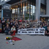 Crowd gathers in front of Hudbay Minerals headquarters for the memorial.