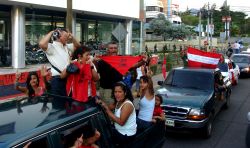 Nov. 30, 2009 - The Resistance caravan steams towards its destination - the Brazilian embassy in which their President is held.  As the people get closer, the military becomes more and more present.  They watch the caravan, automatic weapons at the ready, from side streets and from parks, but people refuse to be intimidated.